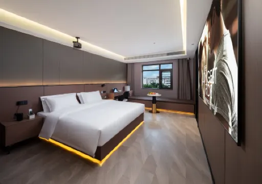 Jinhuang Future Hotel (Honghezhou Government Branch) Отели в г. Мэнцзы