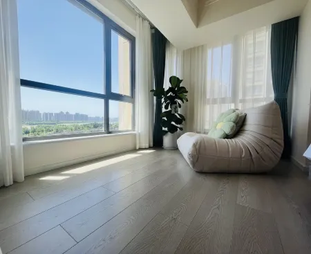 Time Tribe Homestay Отели рядом с достопримечательностью «Luoyang New District Gymnasium»