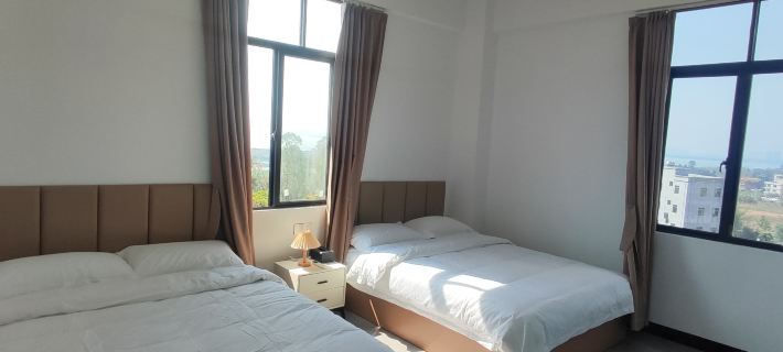 The Seaview Homestay Apartment Hotels in Maoming