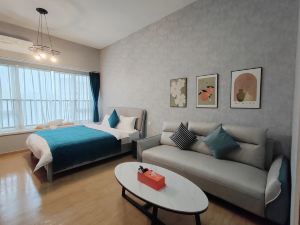 Jingwen International Apartment (Guangzhou Baiyun Station Baixin Plaza)