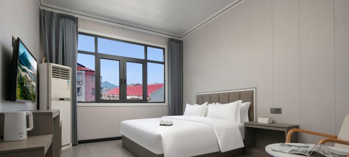 Qijiantang Business Hotel (Baofeng Street) Hotels in Shimen