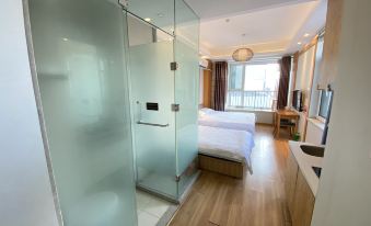 Xinlan Yicheng Apartment Hotel (Qingdao China Railway Expo City)