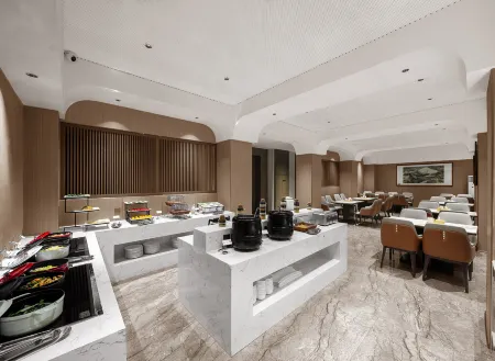 WANXI HOTEL (Xingyang Municipal Government) Отели рядом с достопримечательностью «Xingyang People's Park»