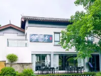 Songfengju Courtyard Hotel (Xingyi Wanfenglin Airport & High-speed Railway Station Branch) Hotels near Maling River Canyon