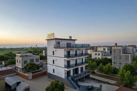 yipinhuahai Отели рядом с достопримечательностью «Denglou Cape»