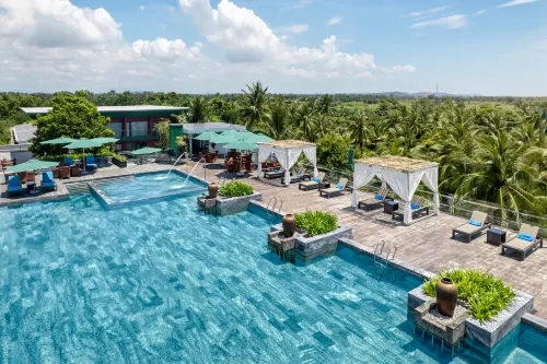 CocoLand Thu Xa Ancient Town Hotel & Resort - bar