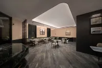 Daqing Yufeng Hotel (Sartu Xinmati Leisure Shopping Plaza)