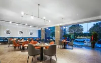 Kyriad Hotel (Tengzhou Xinxing North Road Wuyue Plaza) - فطور