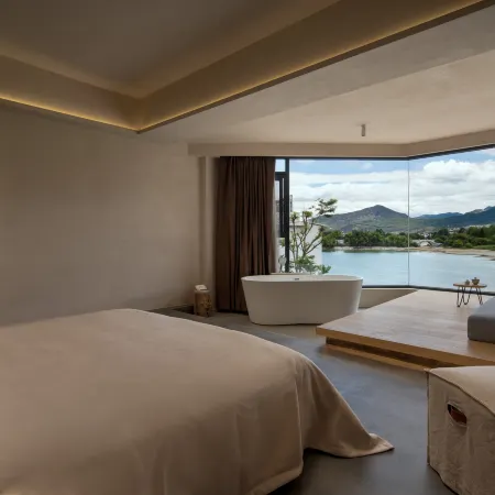 VENTO · Sunlit Golden Peak Lake View Vacation Hotel