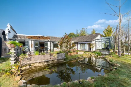 Floral Hotel · Cuntiansu Hotel Отели рядом с достопримечательностью «Chongming Xunyicao Theme Park»