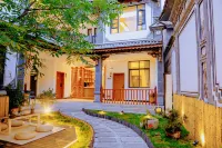Dali Hepu Log Home Inn - Inns