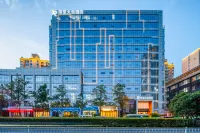 Rezen Wenlan Hotel (Zhengzhou East Station Green Twin Towers Store) Отели рядом со станцией Zhengzhou East жд вокзал