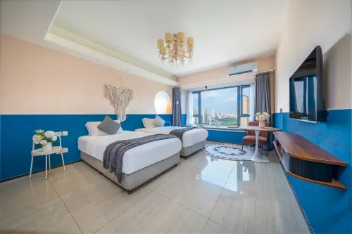 May Boutique Hotel (Xinyang East Railway Station Evergrande Plaza) - balcone