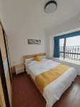 Peninsula Seaview Apartment (Wuchuan Dinglongwan Ocean Kingdom Branch) - balcony