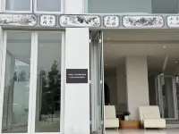 Dali Huali Designer Seaview Homestay Отели в г. Живописная местность Caicun