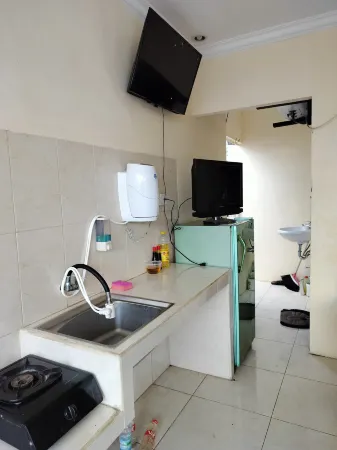 Home Stay Sulfat Indah Syariah Отели в г. Blimbing