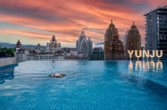 Huiting Yunju Hotel (Xishuangbanna Jinghong Gaozhuang West Shuangjing Xingguang Night Market Branch) โรงแรมใน