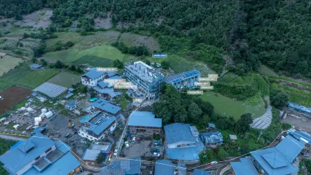 Shan Yu Guesthouse Отели рядом с достопримечательностью «Xiaonong Base camp»