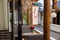 ZHangjiajie Manshe Inn -  Privatzimmer