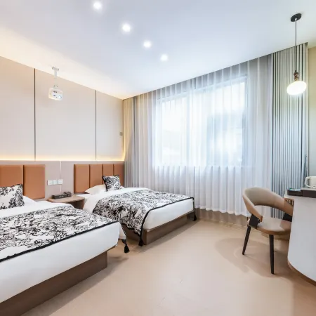 Kaifeng Chunfang Homestay (Wansuishan Millennium City Park) โรงแรมในไคเฟิง