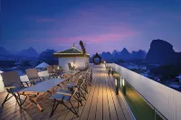โรงแรมมิราเคิล (ถนนเวสต์ หยางซั่ว ลี่เจียง สาขา) - ที่มีฟิตเนส