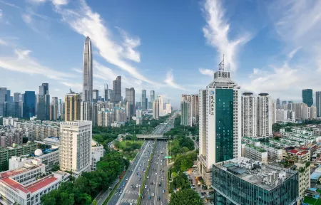 Qingneng Chutian Hotel (Shenzhen Futian Port Convention and Exhibition Center) Отели рядом с достопримечательностью «Nanshan Library»