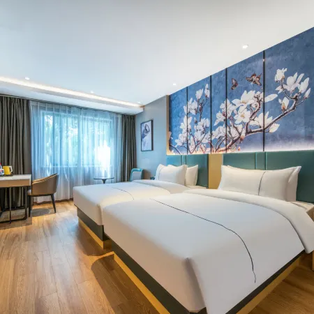 Magnolia Hotel (Qizilou Branch, Lishui University)