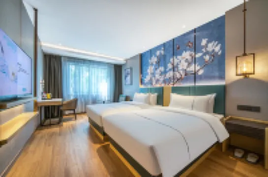 Magnolia Hotel (Qizilou Branch, Lishui University)