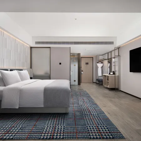 Pingyi Wanda Yuehua Hotel Отели в г. Пини