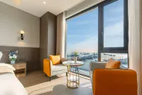 Ronghai Juzhu B&B (Baolong Tiandi Banshengdong Wharf) - Apartments
