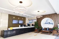 Shell Hotel (Fei County Dongfang Shopping Plaza Ginkgo Jin Street)