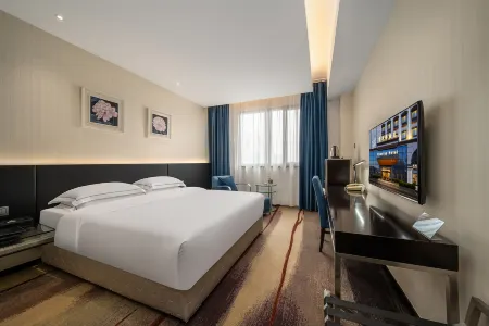 Huaqiao Hotel Отели рядом с достопримечательностью «Jiangsu College of Engineering and Technology»