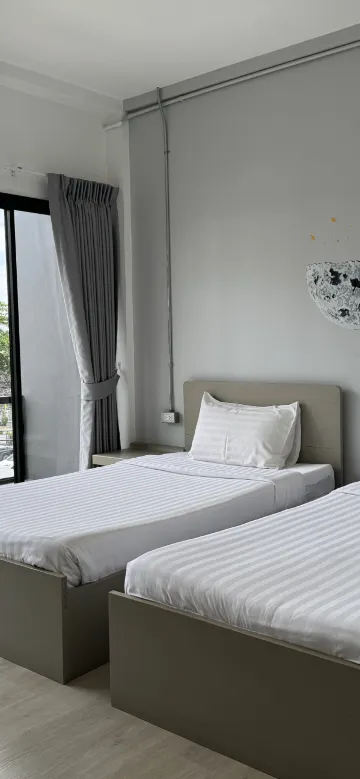 ห้องมาตรฐานเตียงแฝดพร้อมระเบียง