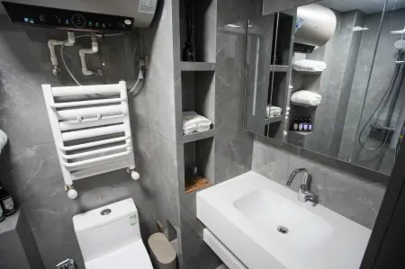 Miyue Light Luxury Hotel (Xingyang Wuyue Plaza) Отели рядом с достопримечательностью «Xingyang People's Park»