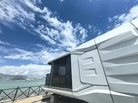 Camp in the stars above the clouds