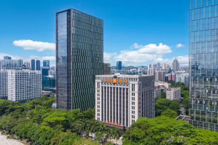 Shangjin International Hotel Отели рядом с достопримечательностью «Baoneng All City Shopping Center Longgang Branch (Jianshe Road)»