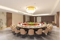 E Zhou Binjiang Ramada Plaza Hotel - petit déjeuner