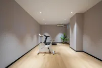 Yantai Binhai Rezen hotel - gimnasio