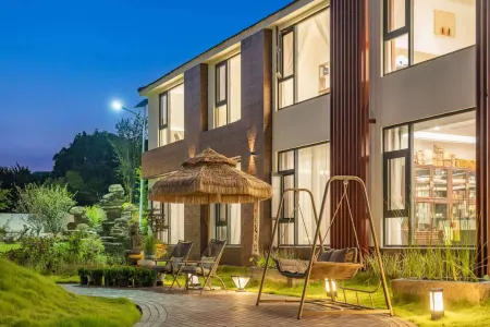 Yixing Oasis Waterfront Garden Homestay Отели рядом с достопримечательностью «Yi Garden»