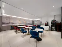 Magnolia Business Hotel (Harbin Railway Station Museum Subway Station) Hotels near Guogeli Street