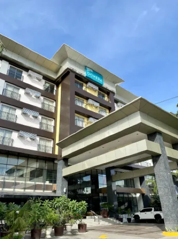 Dohera Hotel Отели рядом с достопримечательностью «Mandani Bay»