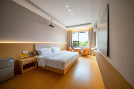 Yuebaiji Hotel Отели рядом с достопримечательностью «Sichuan Institute of Technology (Luojiang Campus)»