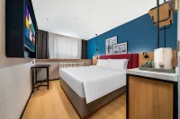 He Yi Zhi Ge Hotel (Harbin Central Street Sophia Cathedral Store) Отели в г. Харбин