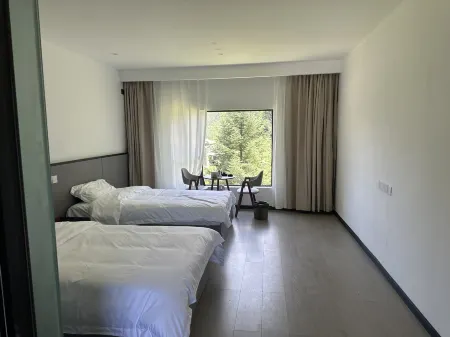 Muya Cangzhai Homestay Отели рядом с достопримечательностью «Lotus Sea»