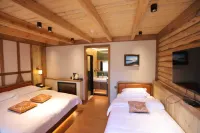 Badai Homestay(Kanas Scenic Area Store) 카나스 강 주변 호텔