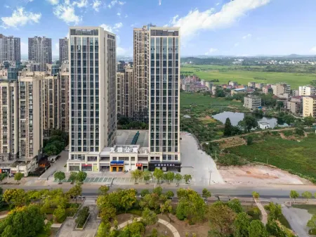 Yinchi Business Hotel (Jinxian County IM Plaza) Отели в г. Цзиньсянь