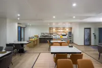 Urba Hotel (Longyan Wanbao Plaza) - فطور