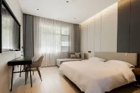 Lohas Hotel (Shangrao Wannian Caifu Pedestrian Street Runfeng Shopping Plaza) Hotel dekat Wannian Railway Station