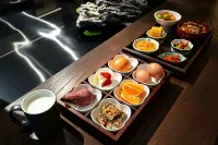 Fragrance Court Courtyard Homestay · Datong - petit déjeuner