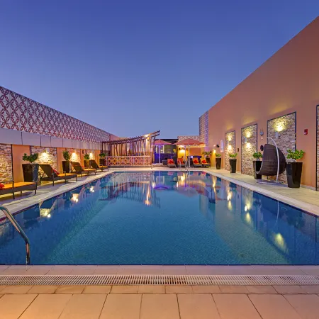 Abidos Hotel Apartment Dubai Land Отели рядом с достопримечательностью «Парк аттракционов Global Village»
